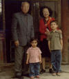 Louis and
          Félix with their great-grandmother and Pu Ren